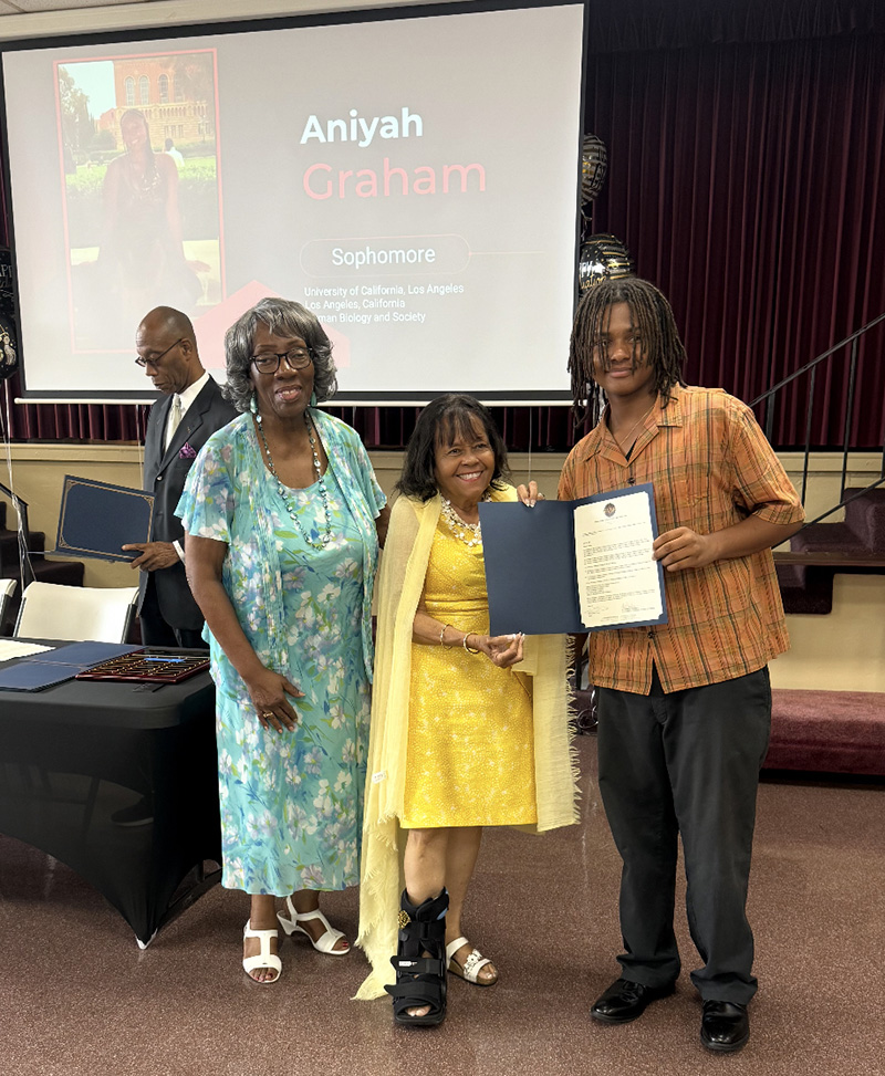 Ms. Sue Beidleman, CSET Chair, Dr. Ruth Creary and  Dr. Ludlow B. Creary Scholar, Aniyah Graham,  
Sophomore at University of California,  Her Brother, Solomon Graham, accepting the Scholarship Award.