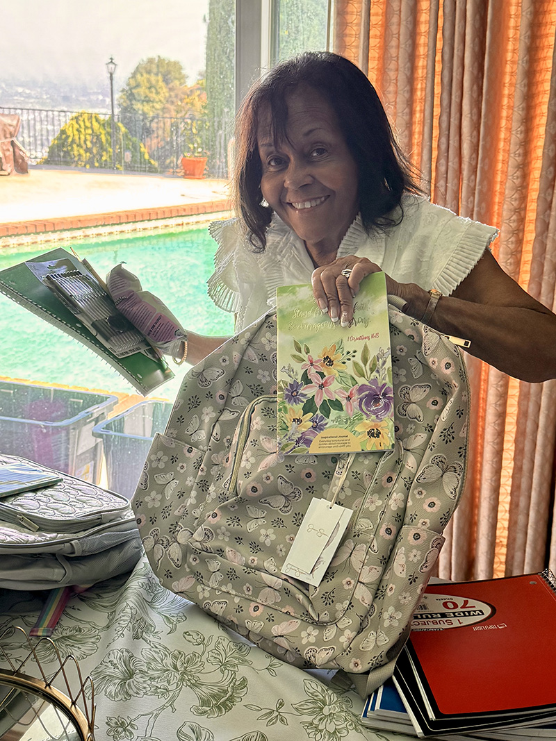 Dr. Ruth Creary (CFF) preparing the Backpack's donations.